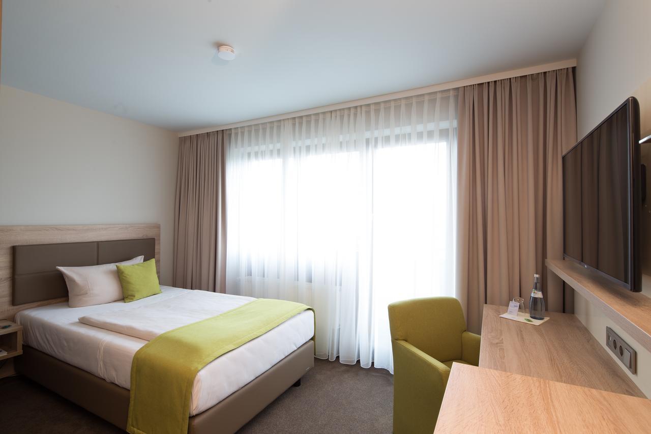Aramis Tagungs- Und Sporthotel Gaufelden Bagian luar foto